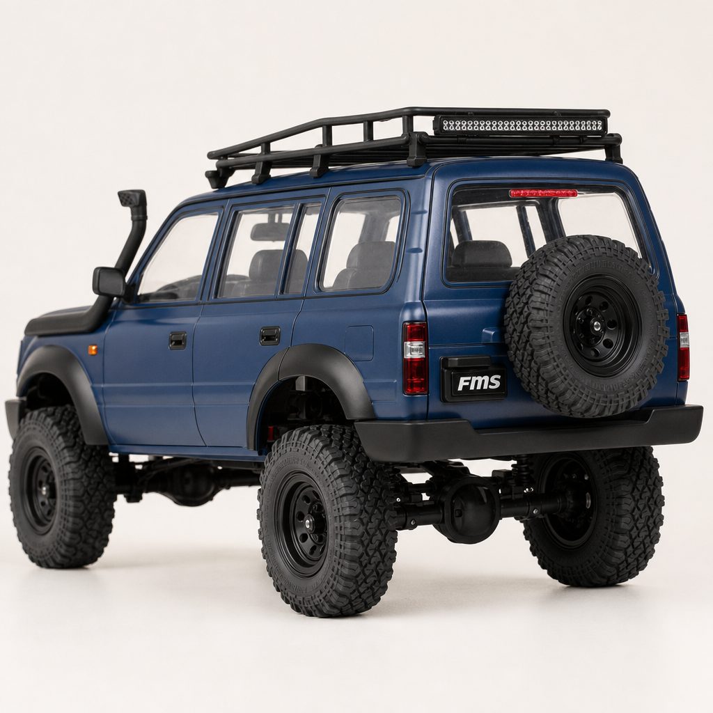 Details including the snorkel, roof rack, light bar and functional spare-wheel mount give the Land Cruiser the convincing look of a miniature overland build.