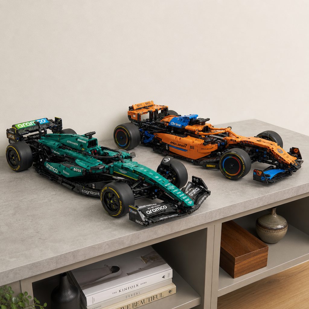 At 61cm long, neither Technic car is a modest desktop ornament. Measure the shelf before building, not after discovering that the front wing now lives over the edge.
